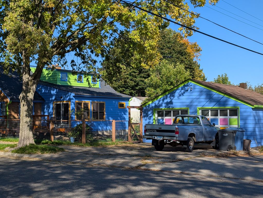 colorfully painted house and garage